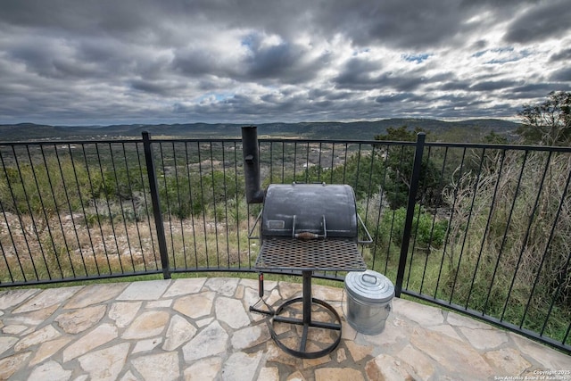 balcony featuring a mountain view