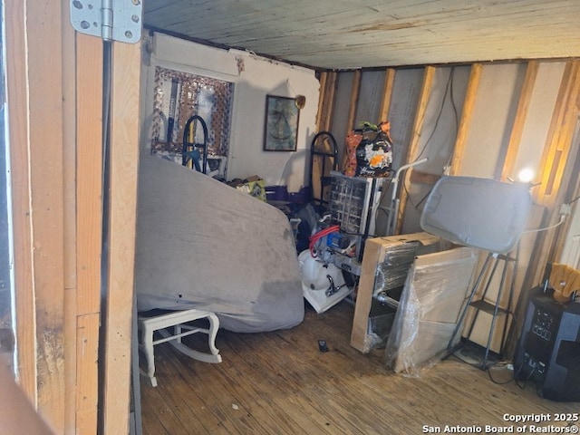 bedroom with wood-type flooring