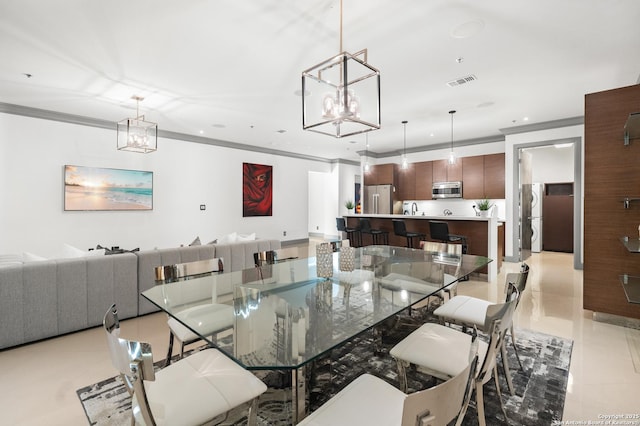 tiled dining area with crown molding