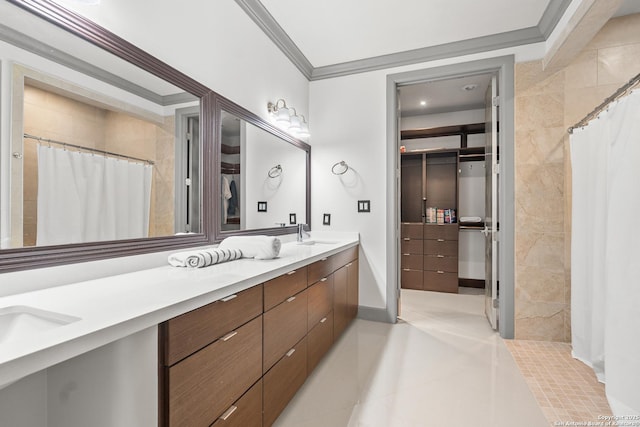 bathroom with tile patterned flooring, vanity, curtained shower, and ornamental molding