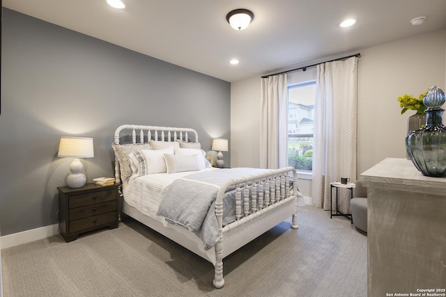 bedroom with light colored carpet