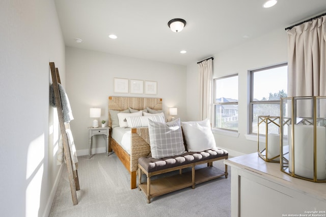 bedroom with light colored carpet