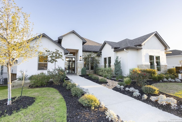 view of front of home with a front yard