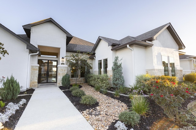 doorway to property featuring french doors