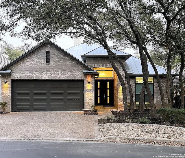 view of front of home with a garage