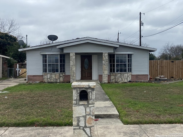 view of front of property with a front lawn