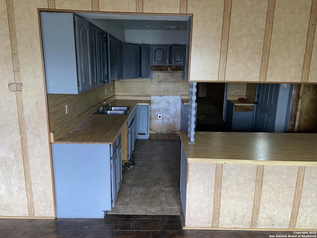 kitchen featuring dishwasher and sink