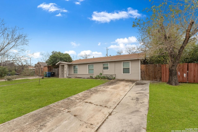 single story home featuring a front lawn