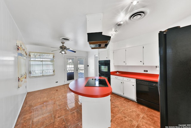 kitchen with a center island, french doors, black appliances, ceiling fan, and white cabinetry