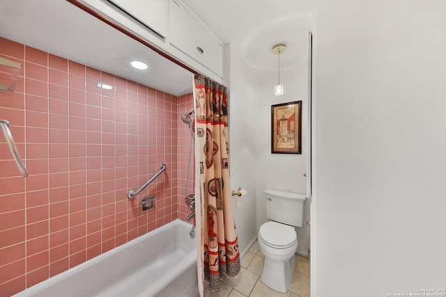 bathroom with tile patterned flooring, shower / bath combo, and toilet