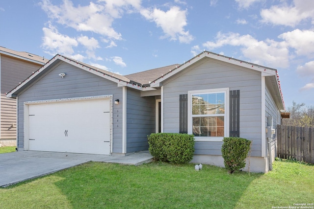 ranch-style home featuring a front yard and a garage