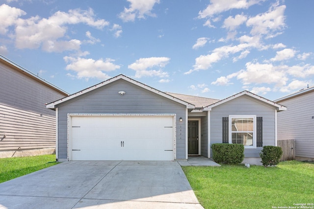 ranch-style home featuring a garage and a front lawn