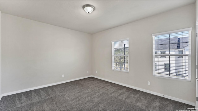 unfurnished room with carpet floors