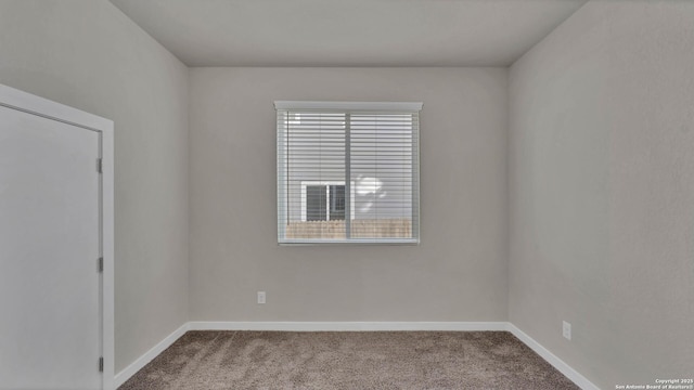 view of carpeted spare room