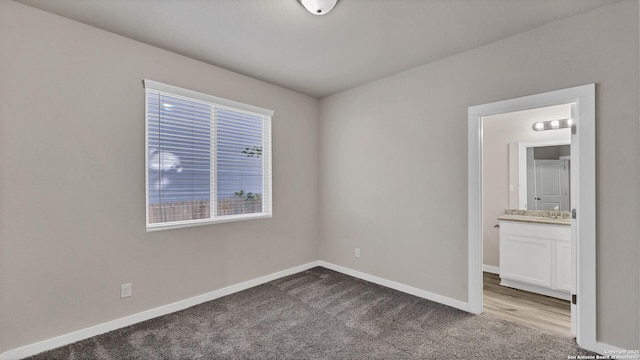 interior space featuring light carpet