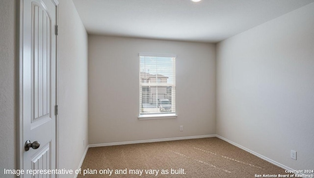 view of carpeted spare room