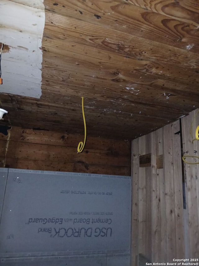 room details with wood walls and wooden ceiling