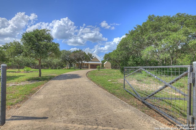 exterior space with a lawn and a rural view