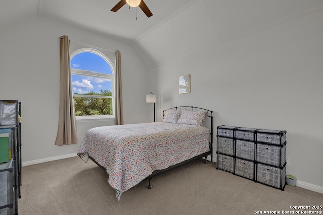 bedroom with light carpet, ceiling fan, and lofted ceiling