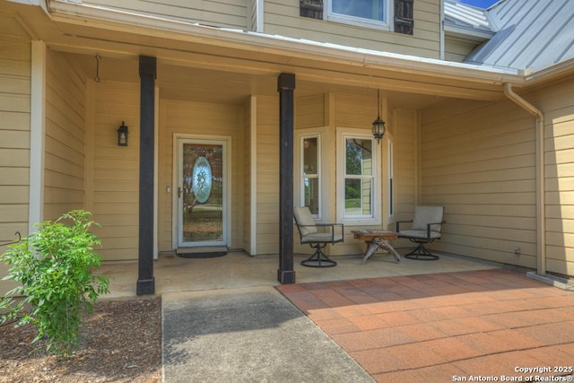 doorway to property featuring a porch