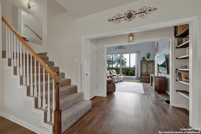 interior space with dark hardwood / wood-style floors