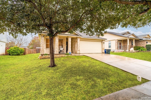 view of front facade featuring a front yard and a garage