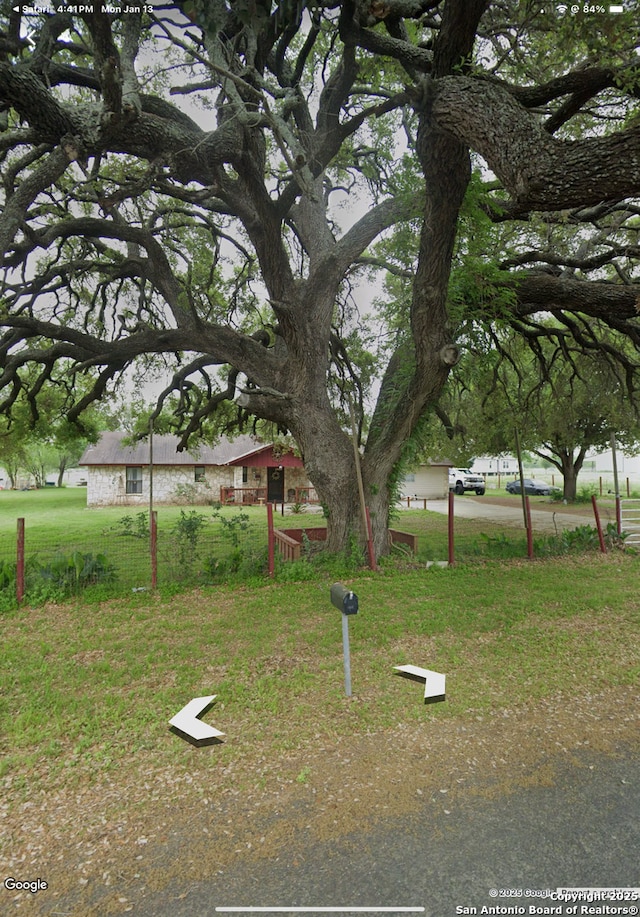 exterior space with a yard