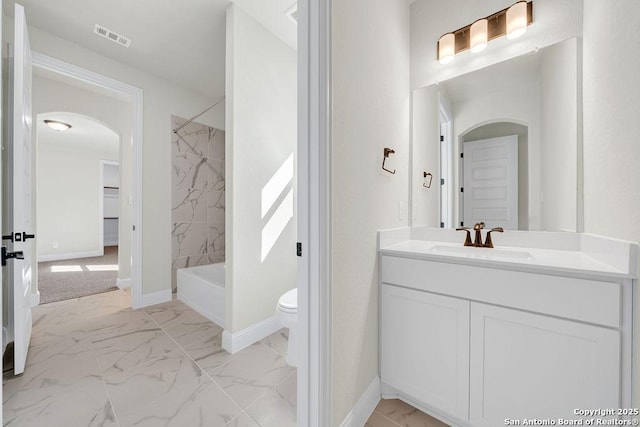 bathroom featuring marble finish floor, baseboards, visible vents, and vanity