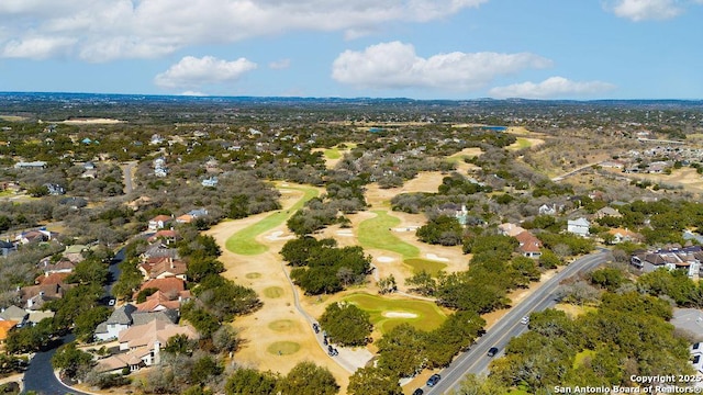 aerial view with view of golf course and a residential view