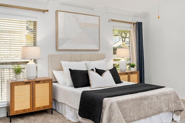 bedroom featuring carpet flooring and crown molding