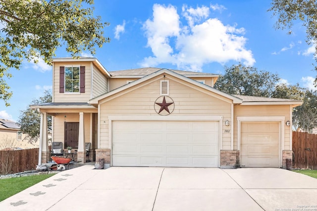 view of front of property featuring a garage