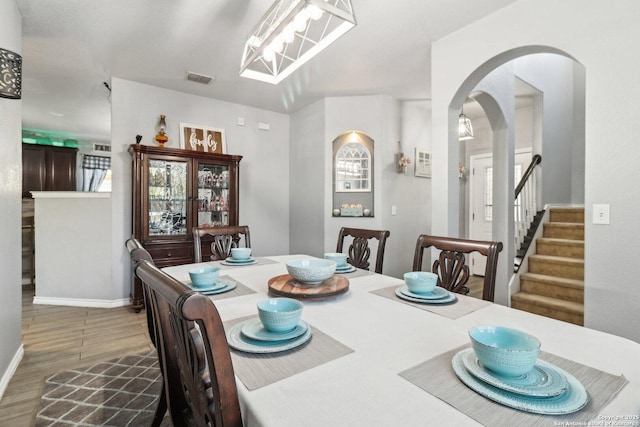 dining room featuring hardwood / wood-style flooring