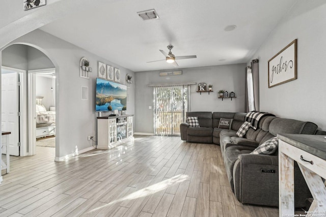 living room with ceiling fan