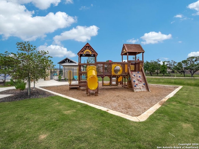 view of jungle gym featuring a yard