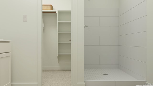 bathroom featuring vanity and walk in shower