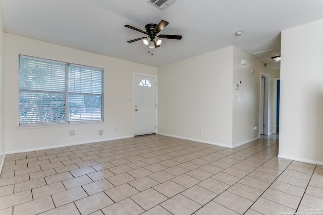 interior space featuring ceiling fan and light tile patterned flooring