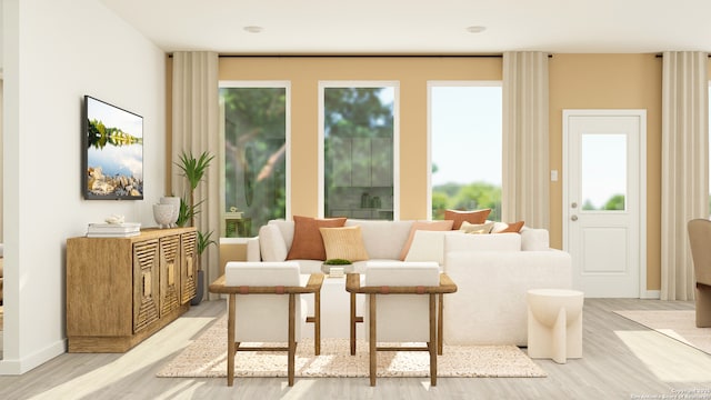 sitting room featuring light hardwood / wood-style flooring