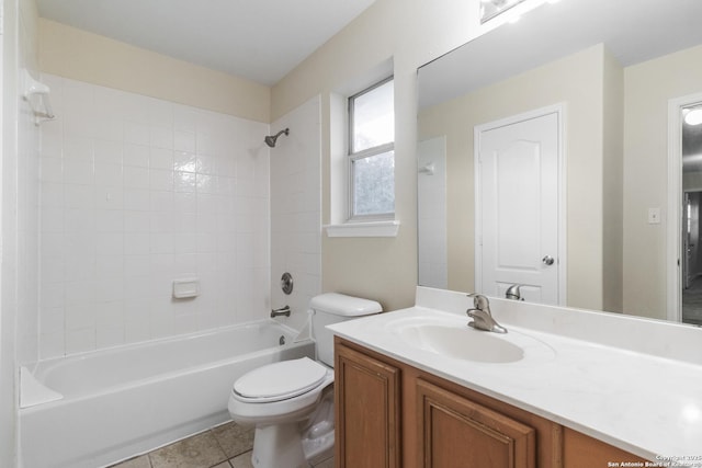 full bathroom featuring tile patterned floors, vanity, toilet, and washtub / shower combination