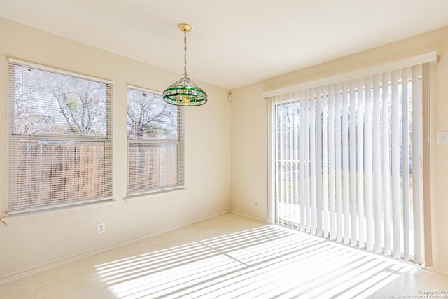 empty room featuring a wealth of natural light