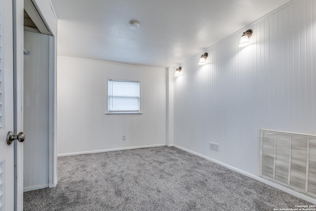 unfurnished room featuring carpet floors