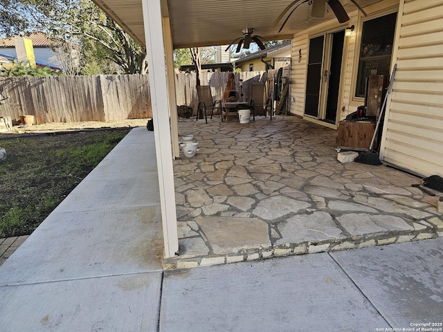 view of patio featuring ceiling fan