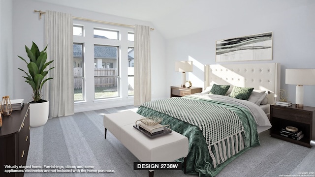 bedroom featuring carpet flooring and lofted ceiling