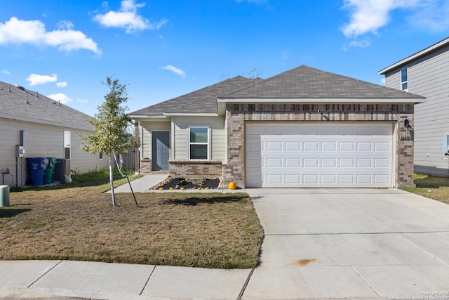 single story home featuring a garage