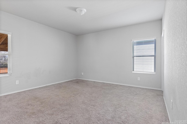 view of carpeted spare room