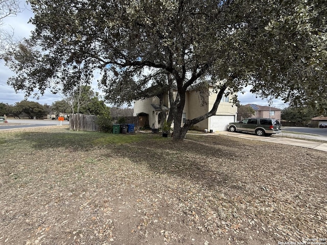 exterior space with a garage