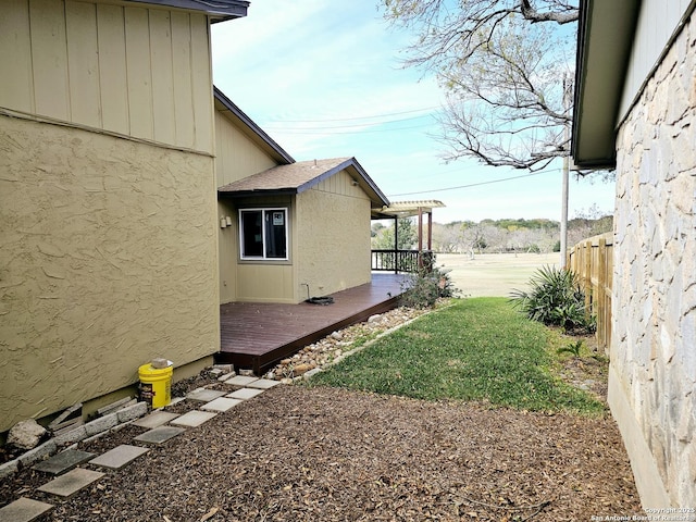 view of yard featuring a deck