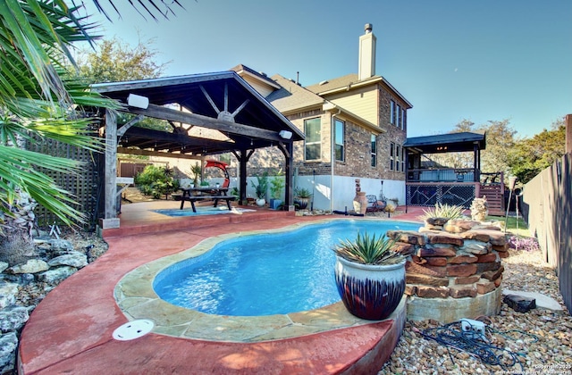 view of swimming pool featuring a patio