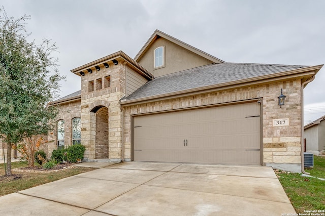 view of front of property featuring a garage