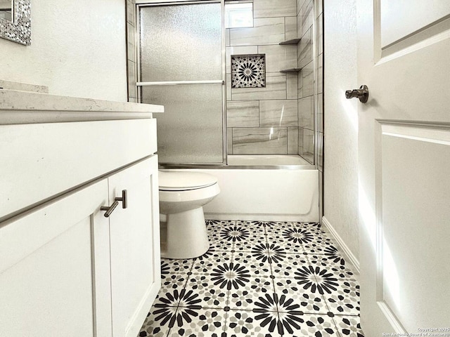 full bathroom with vanity, toilet, and tiled shower / bath