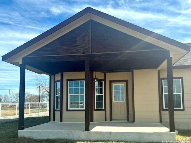 entrance to property with a porch